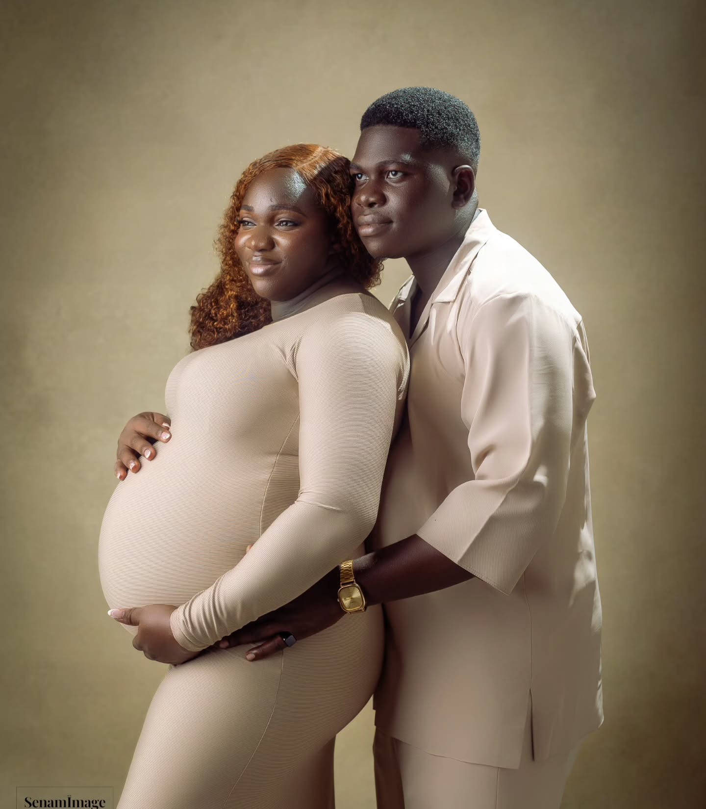 Soft neutrals — matching maternity moment in the studio.