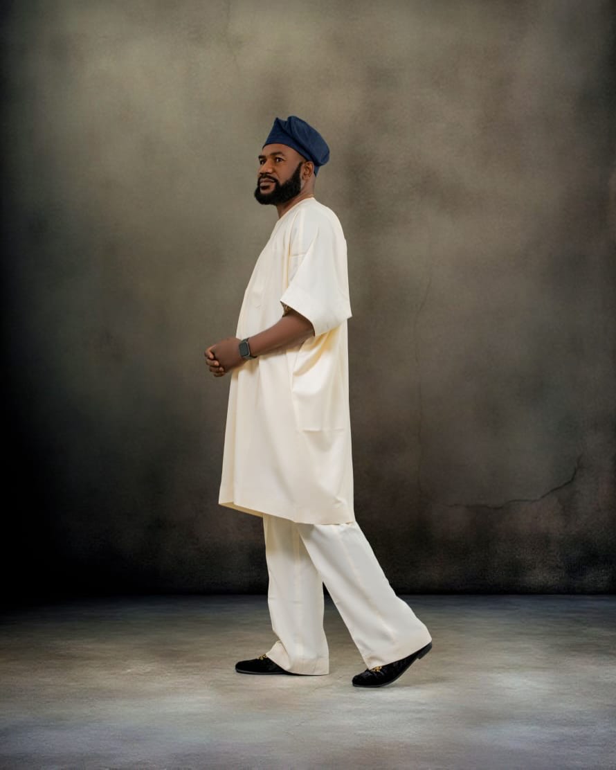 Ivory agbada set, studio-lit and sculptural.