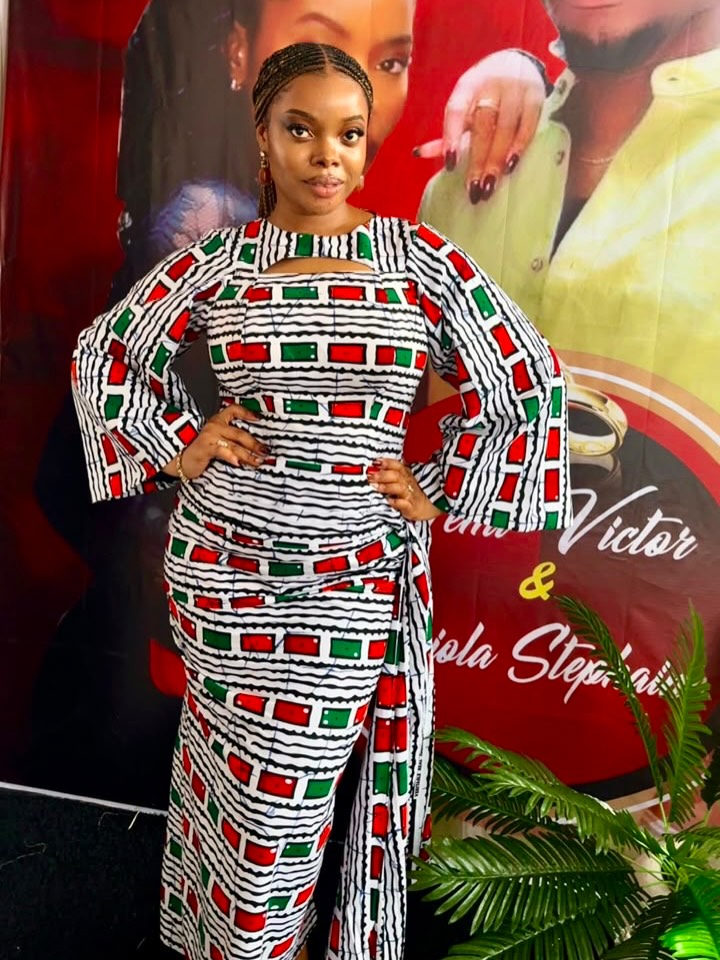 Ankara two-piece with a cape sleeve statement.